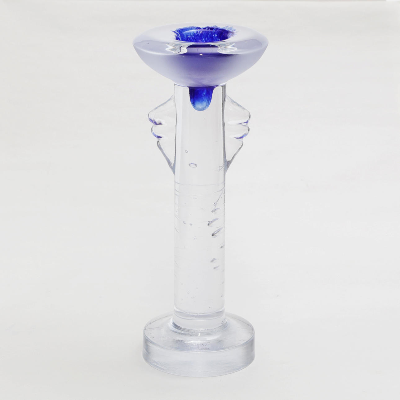 A glass candlestick “Gabriel” unsigned.