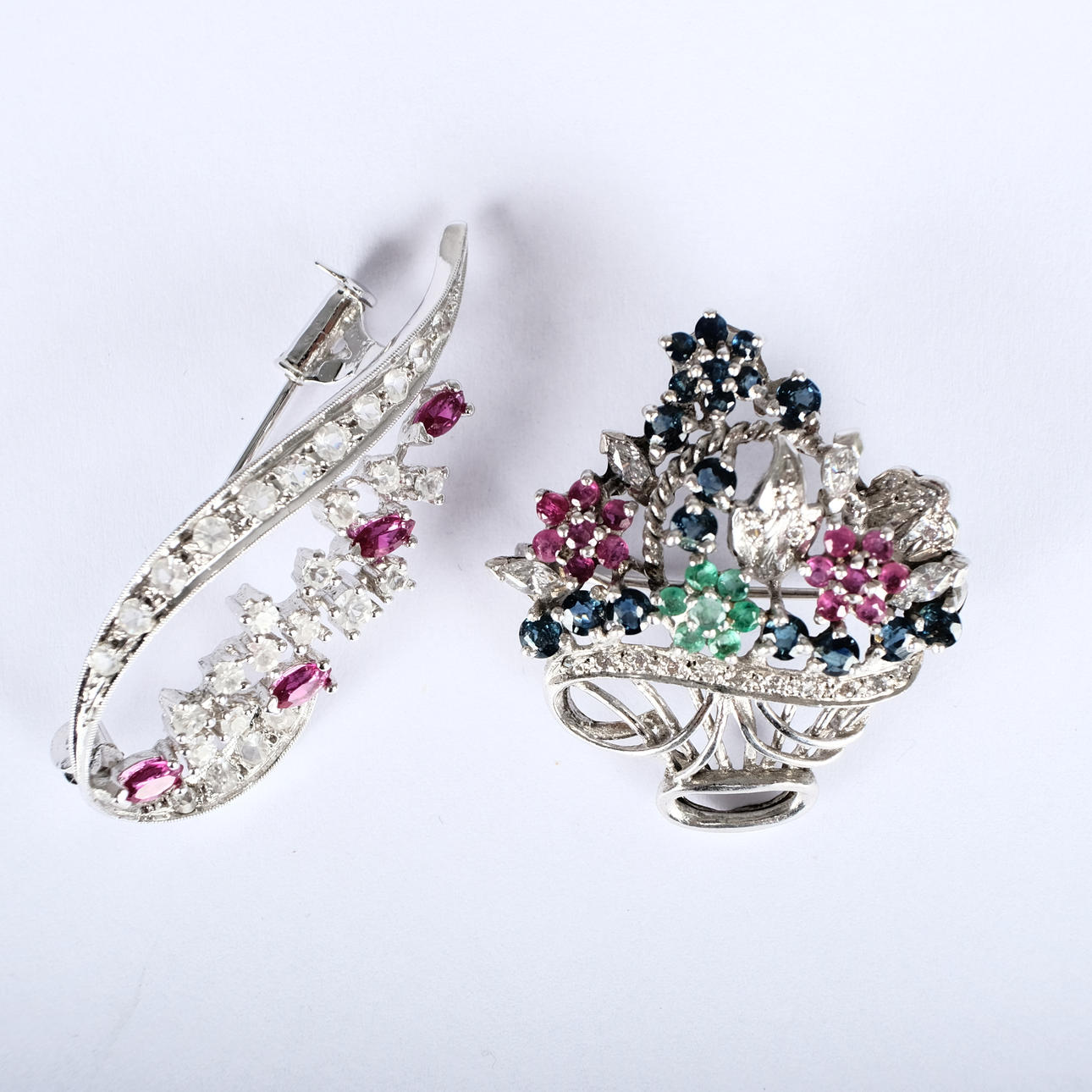 BROOCHES. Silver, studded with different coloured stones 20th century (2pcs).