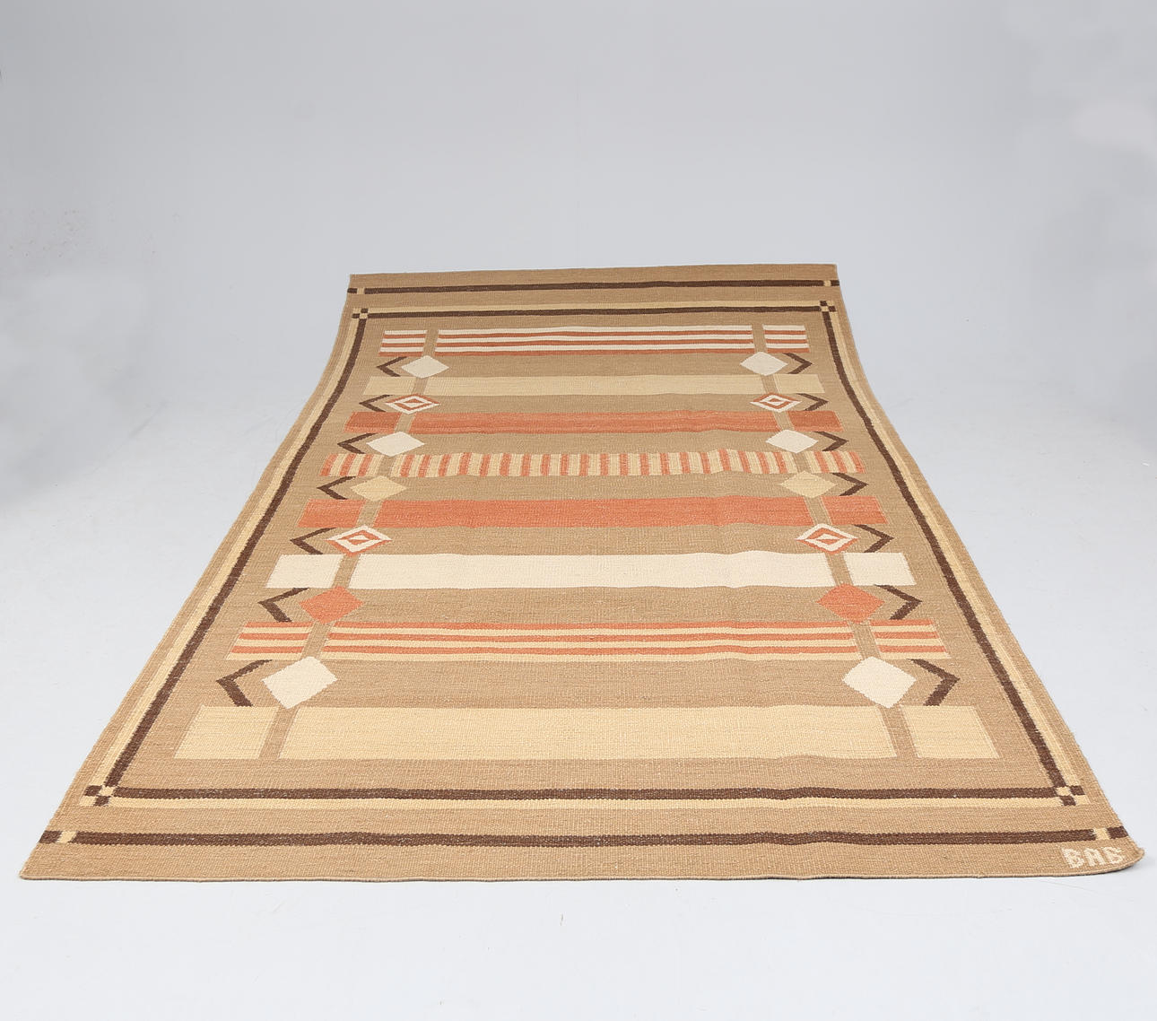 A RUG, wicker linen, signed BAB.