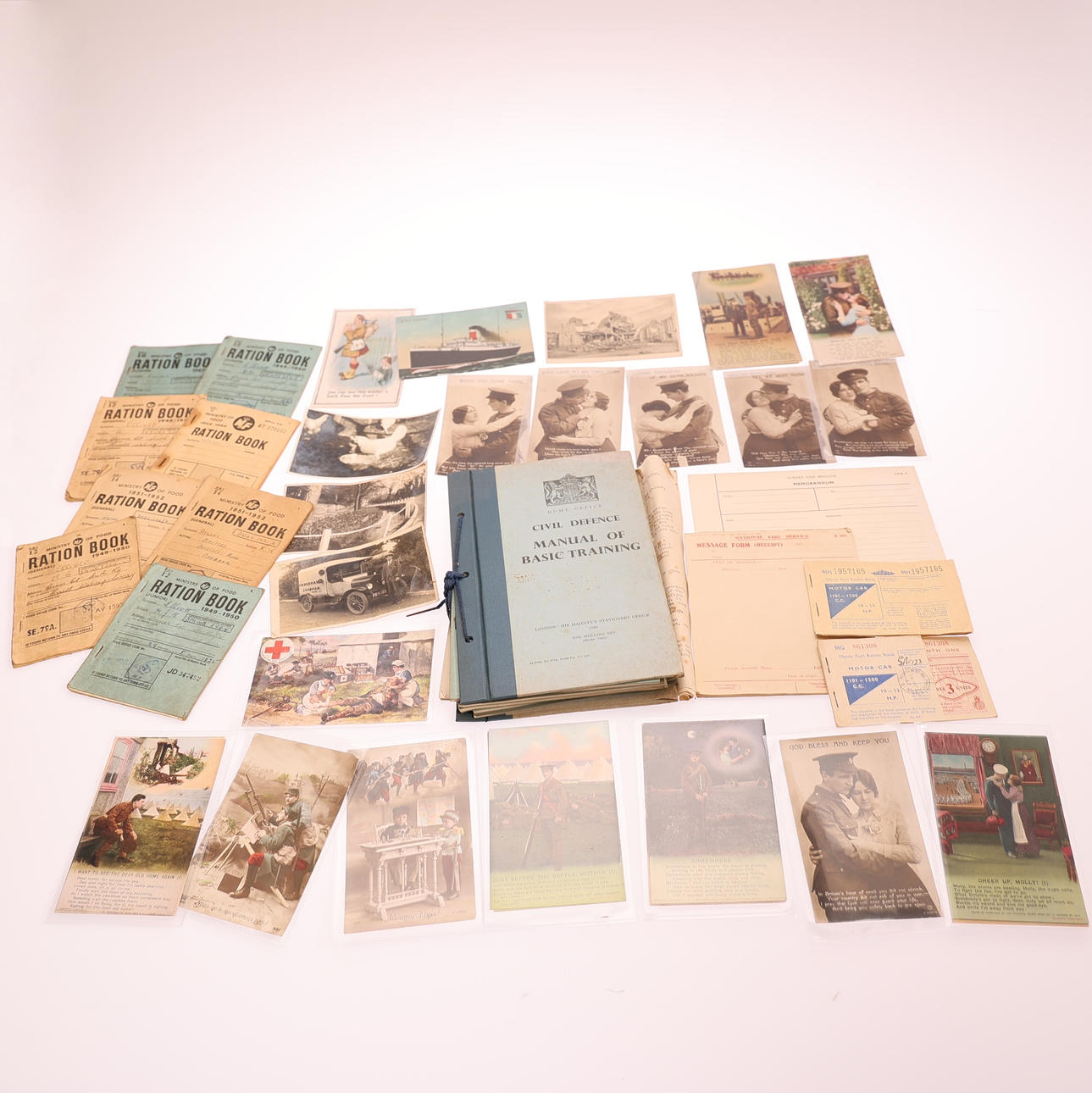 QUANTITY OF ASSORTED MILITARY POSTCARDS AND EPHEMERA.