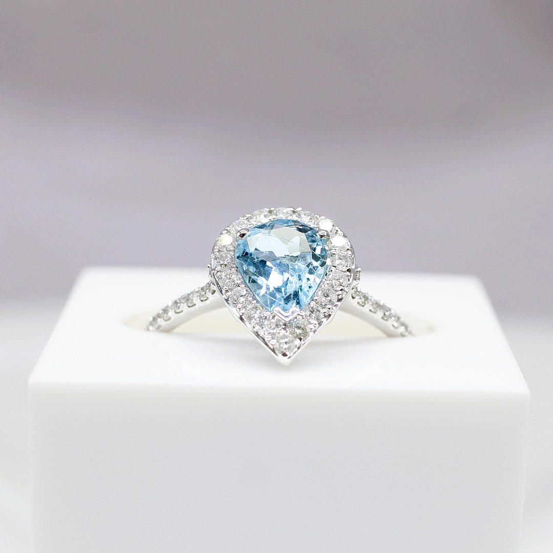 AQUAMARINE & DIAMOND TEARDROP RING.