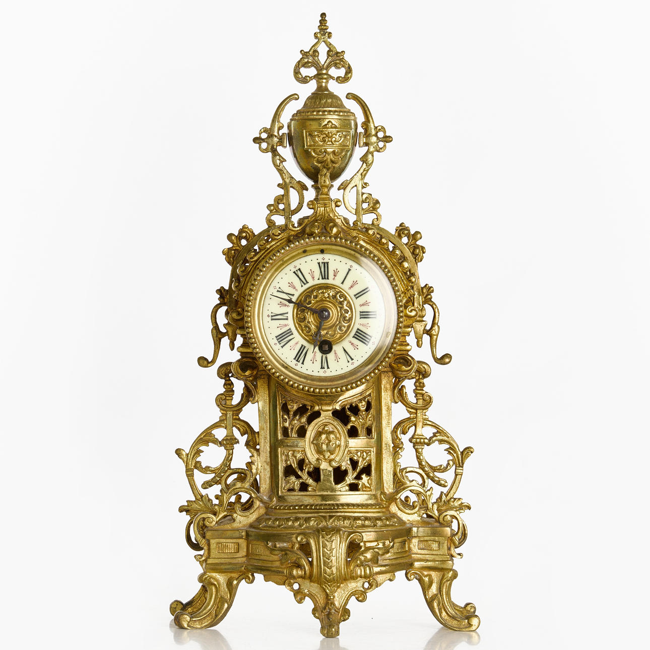 A French brass table clock with porcelain dial. circa 1900.