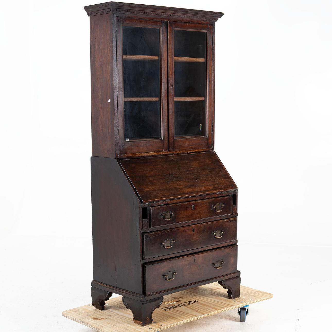 A late 19th century writing cabinet with display case.