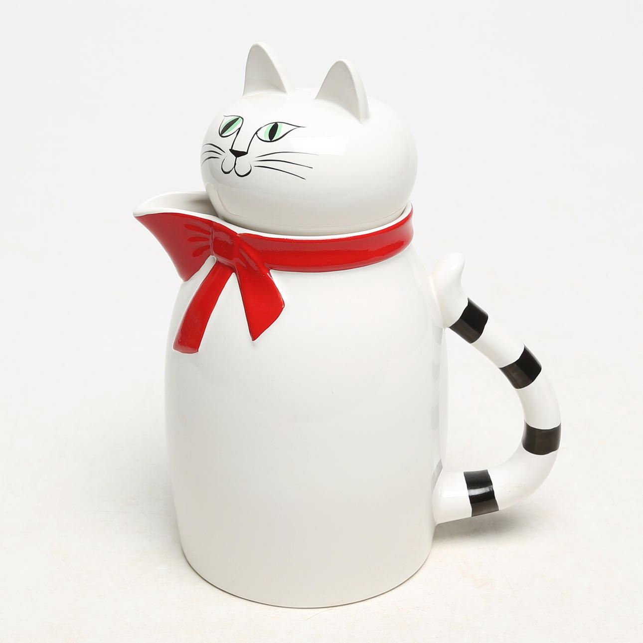 LISA LARSON. JUG with cat head cover, tablecloth. The shops.