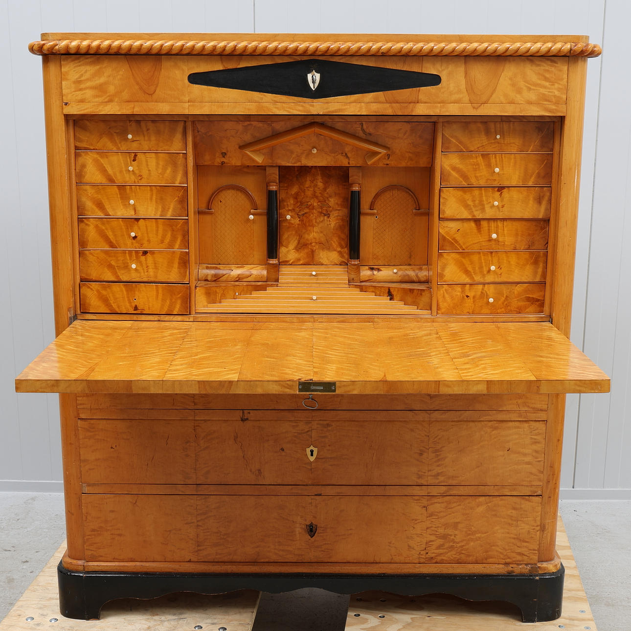 A 19th century birch empire chiffonjé.