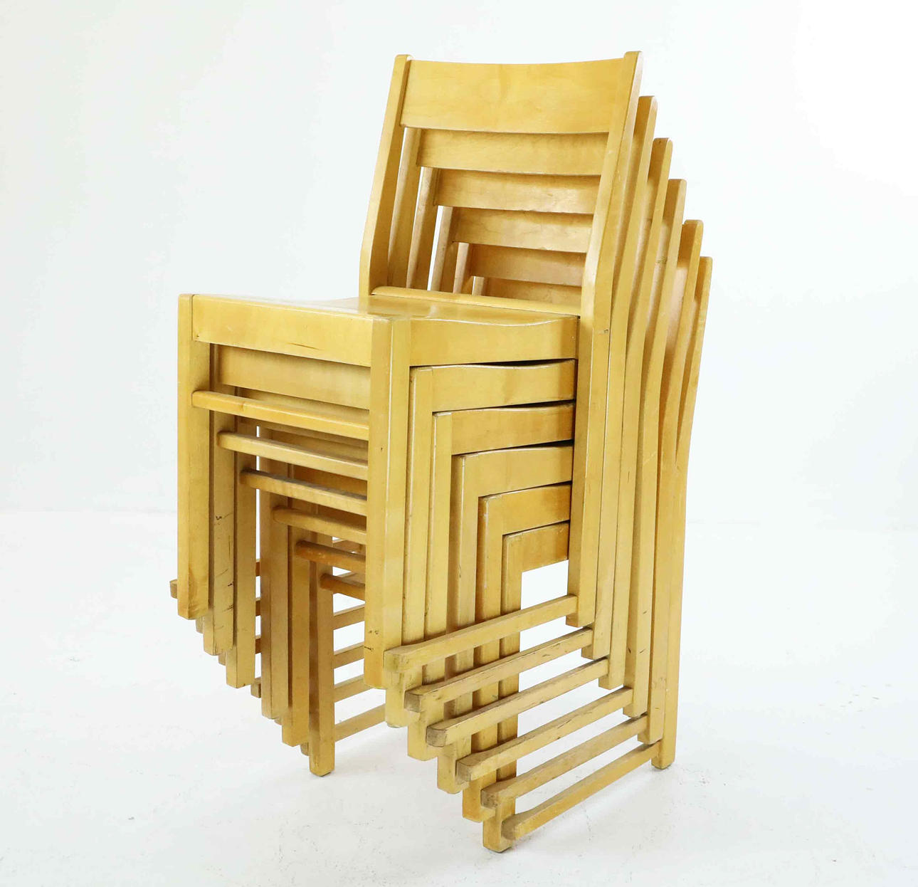 A set of 6 stackable 20th century orchestra chairs.