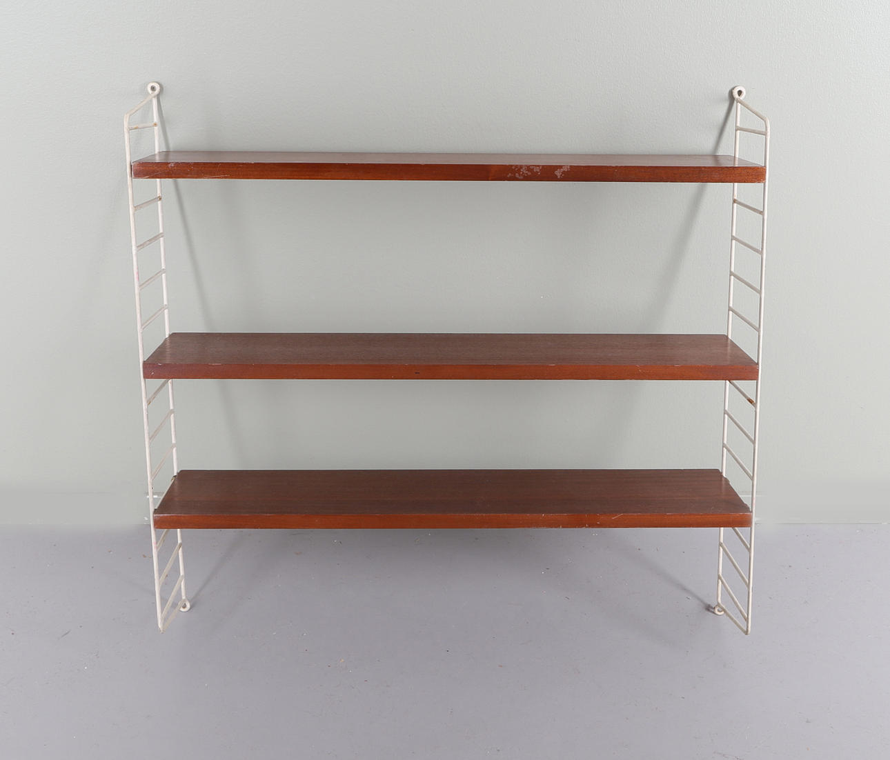 STRING SHELF, mahogany, mid-20th century.