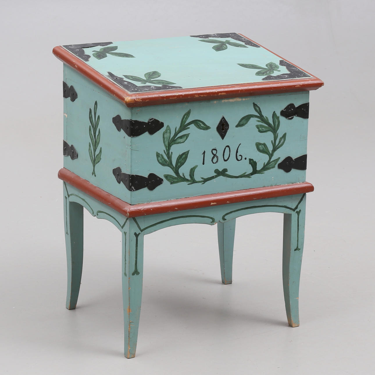 A chest of drawers, handstand on legs, dated 1806.