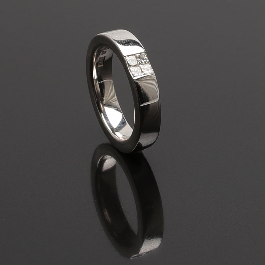 ALLIANSRING Hans Strömdahl AB i 18 K vitt guld med diamanter 0,24 ct Tw/vs-si.