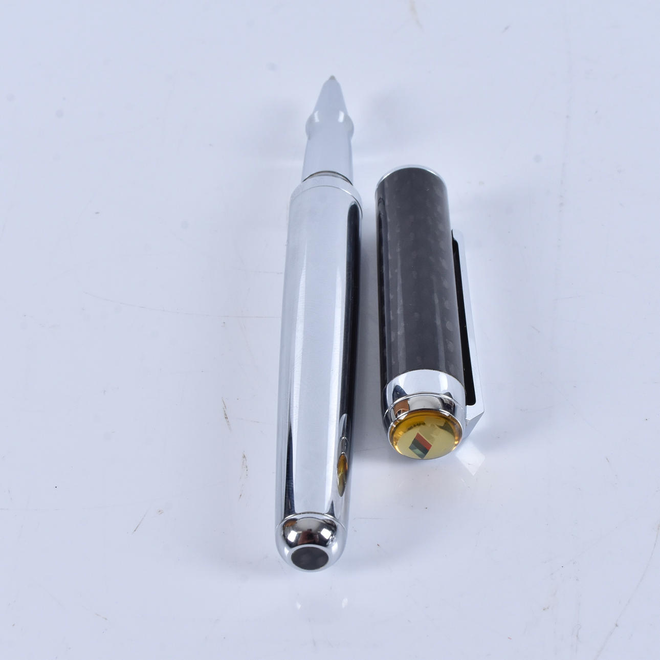 BALLPOINT PEN, steel with carabiner inserts.