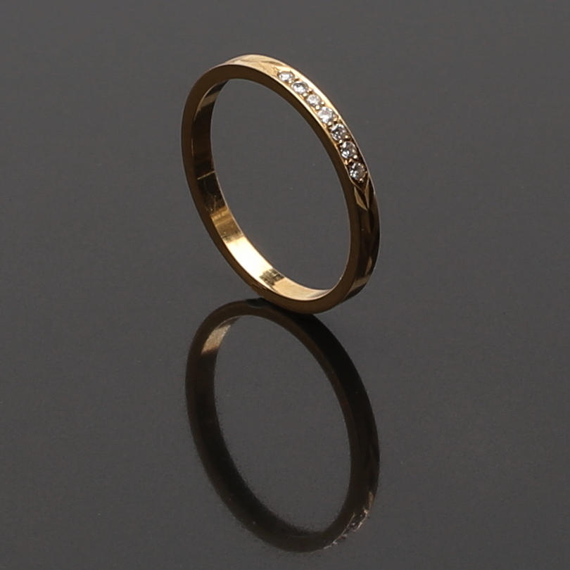 ALLIANSRING i 18 K gult guld med diamanter 0,07 ct. Engelbert 1983.