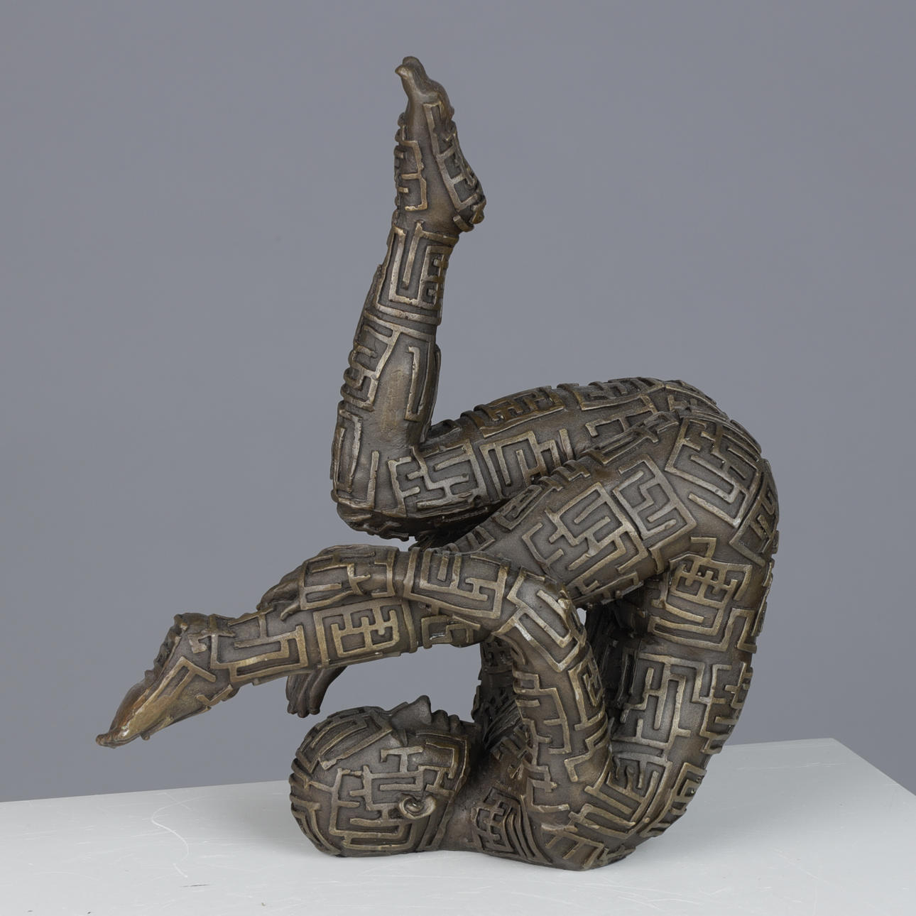 Yoga exercise bronze figure 'Puzzle Man' 20 century.