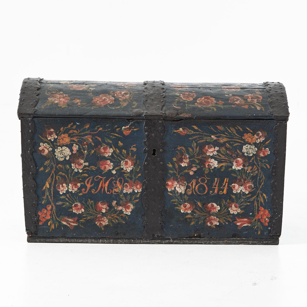 A chest painted with roses, dated 1844.