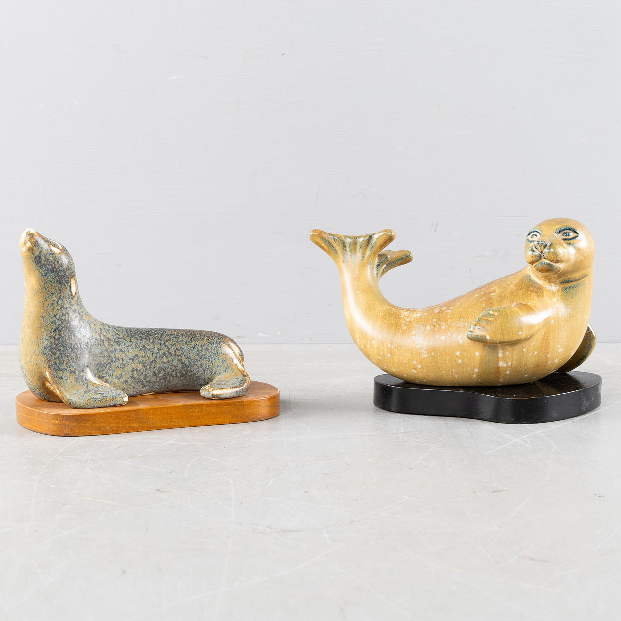 GUNNAR NYLUND. Seals, 2 pieces, glazed stoneware, Rörstrand.