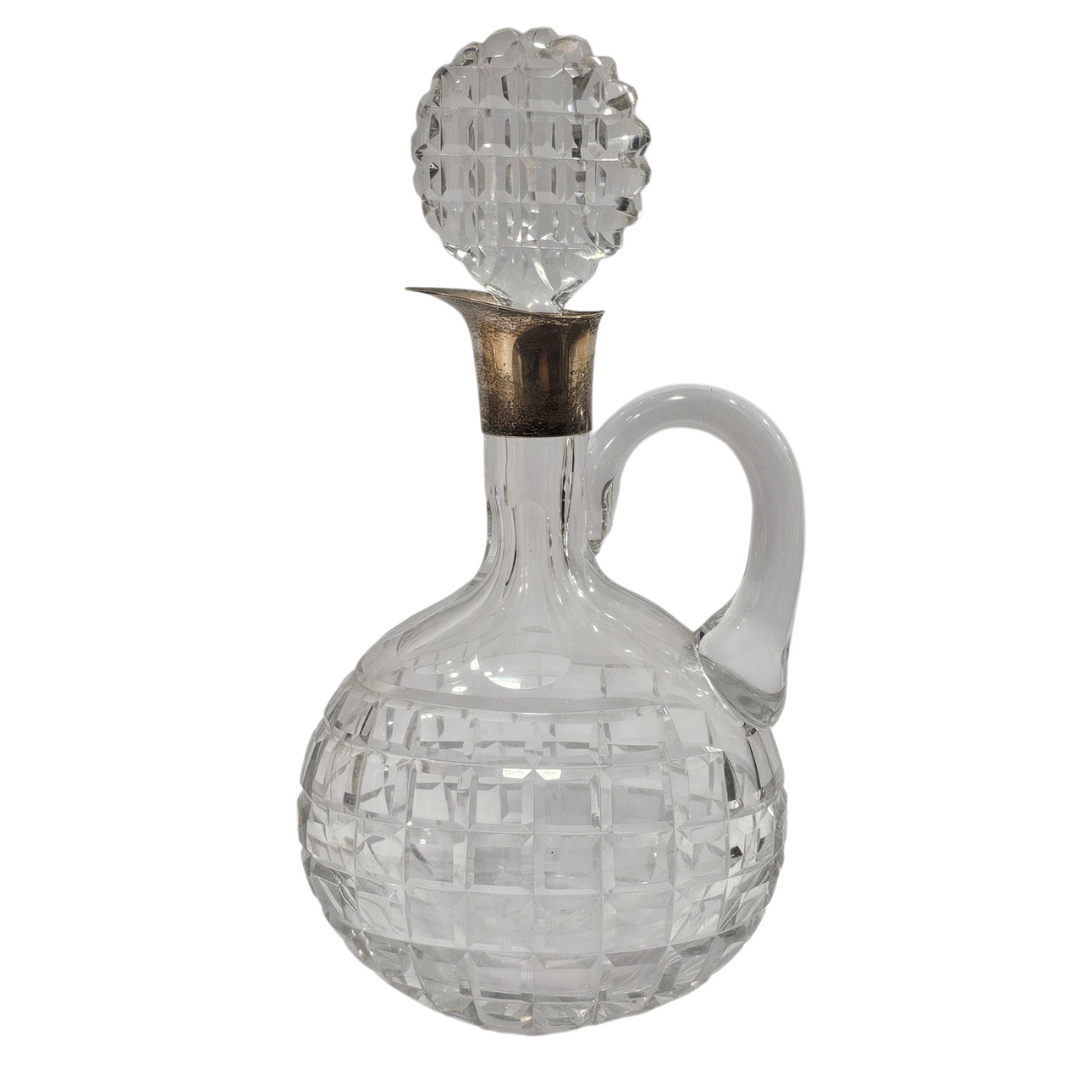 Carved glass jar with punched silver collar.