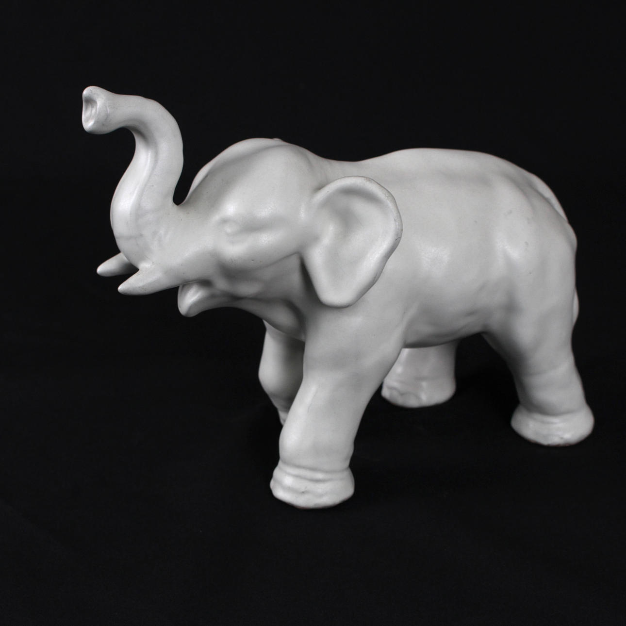 A figurine of an elephant, glazed earthenware, probably Upsala Ekeby.