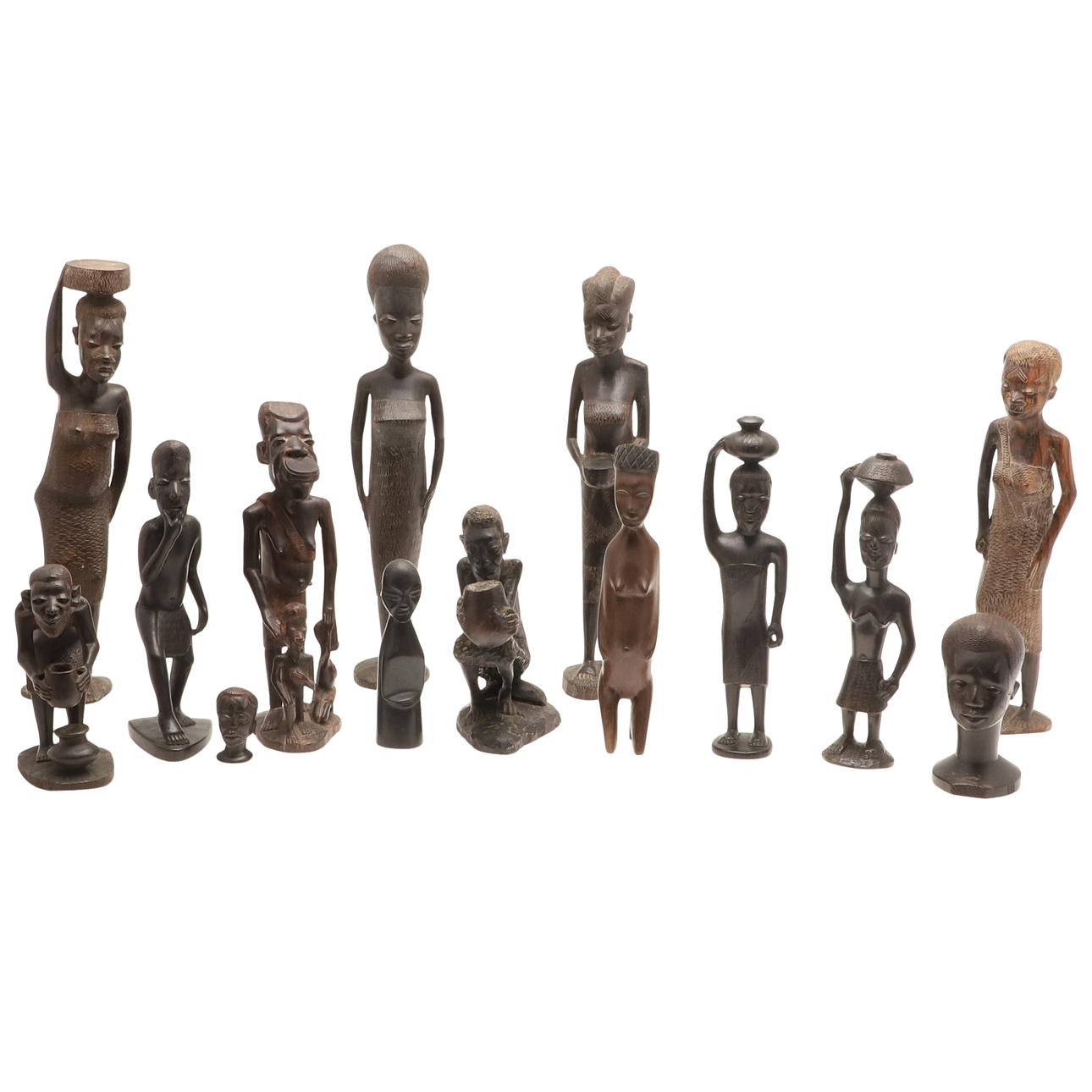 A COLLECTION OF FOURTEEN AFRICAN MACONDE CARVED HARDWOOD FIGURES ...