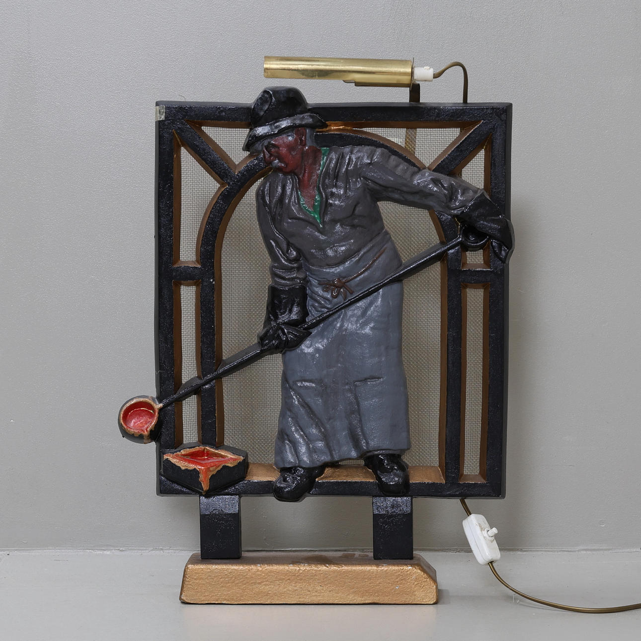 A sculpture, cast iron, foundry workers, 20th century.