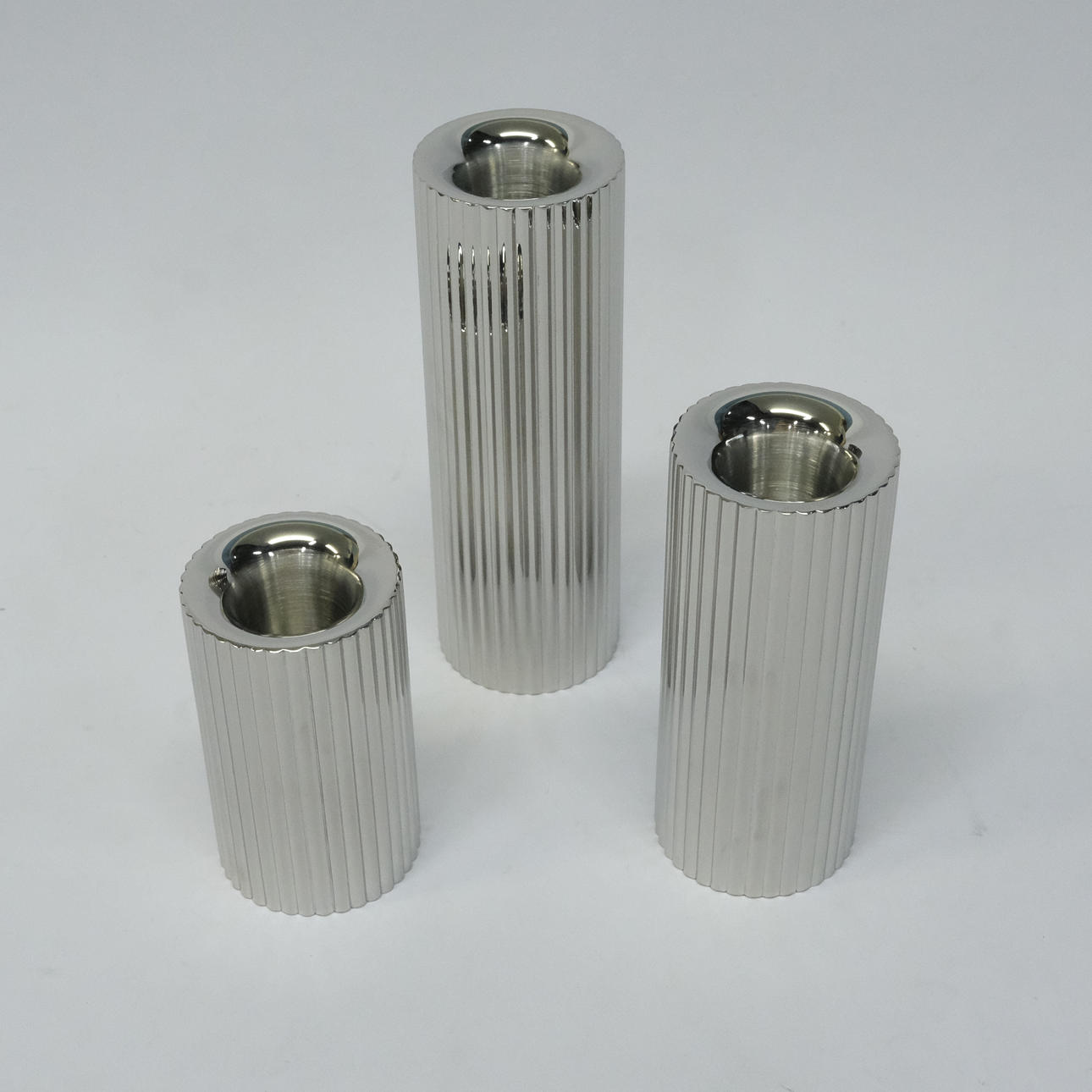 GEORG JENSEN, THREE CANDLESTICKS, “THE BERNADOTTE COLLECTION”.