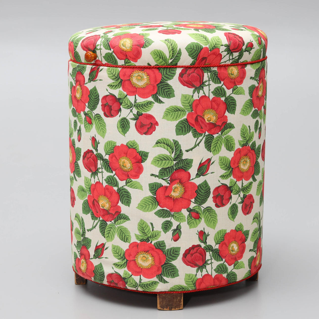A fabric covered sewing stool, 20th century.