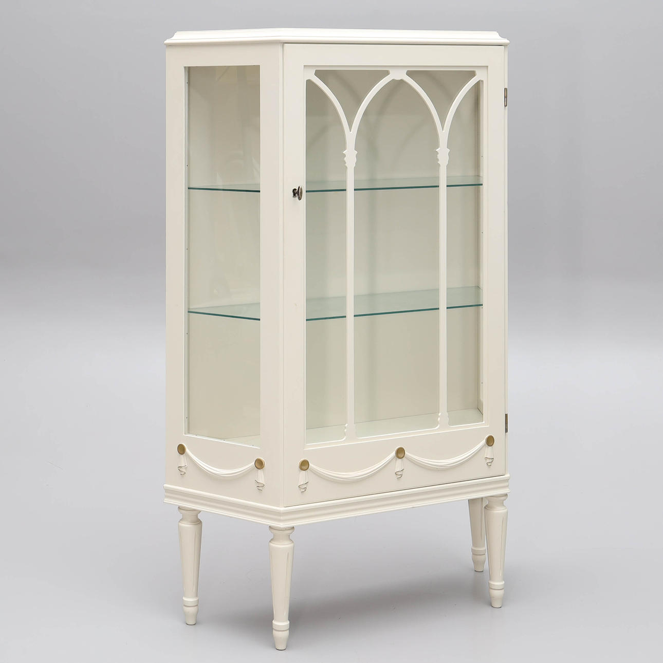 A Gustavian style display cabinet, 20th century.