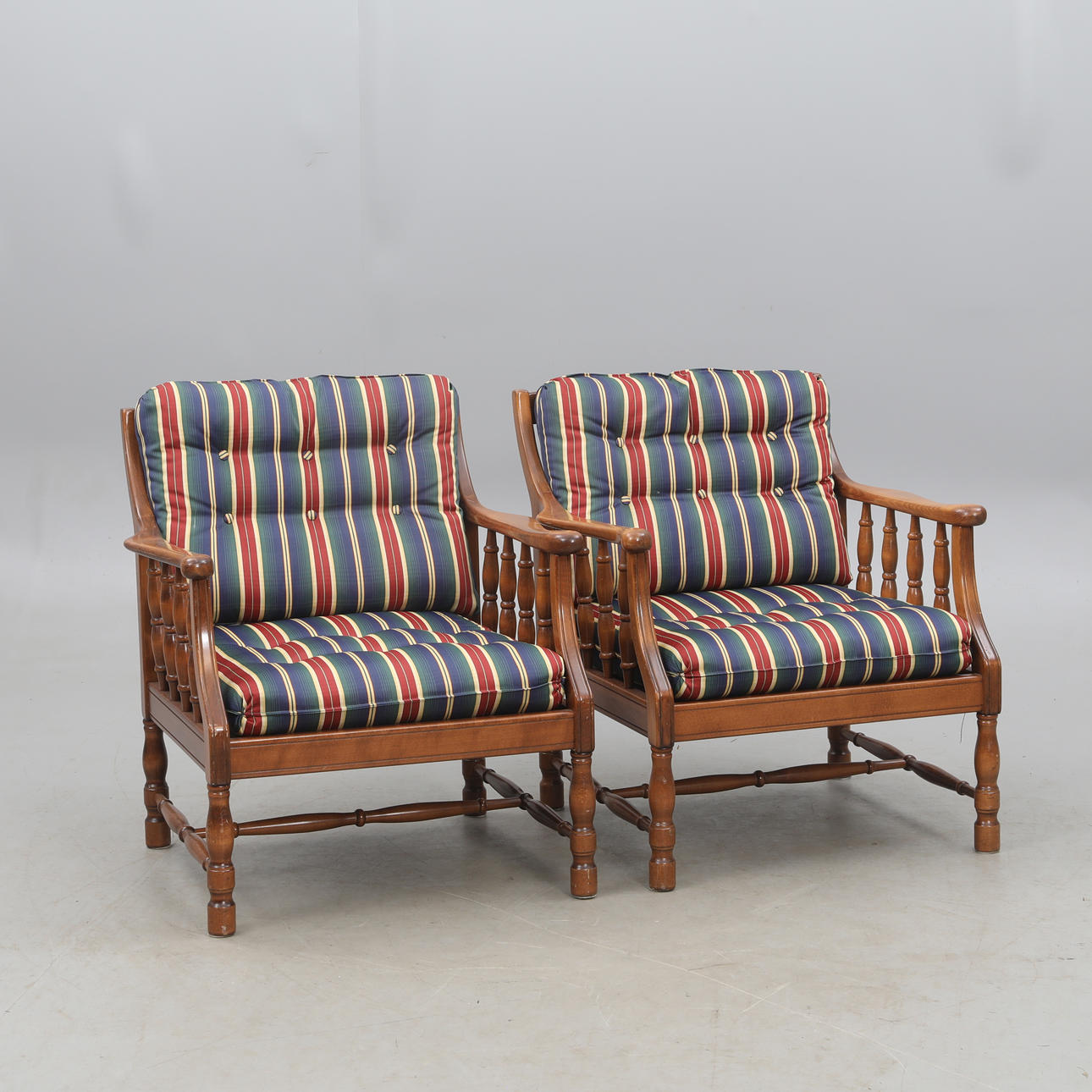 Armchairs, a pair, reversible cushions.