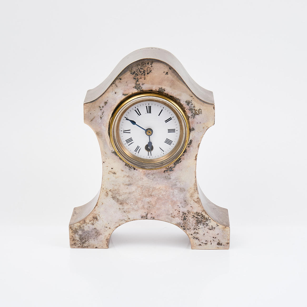 TABLE CLOCK. A silver, K Andersson, Stockholm, 1909, dial enamel, back case mahogany.