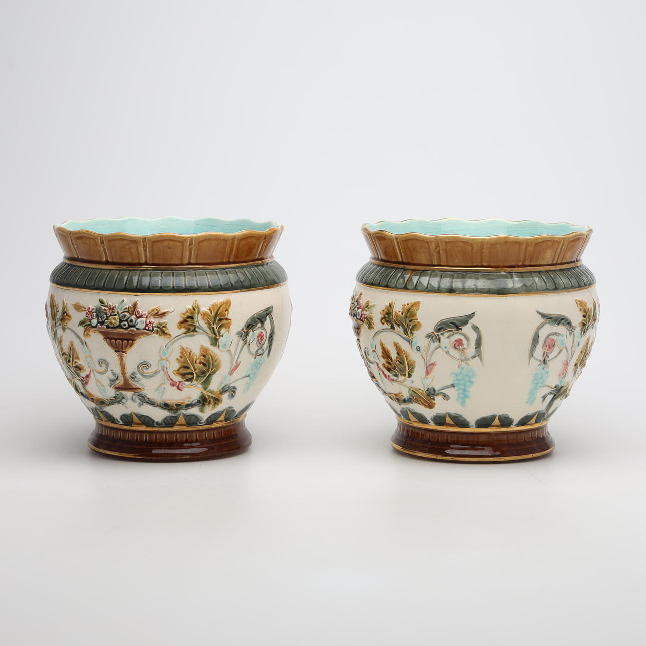A pair of majolica porcelain outer liners, Rörstrand.