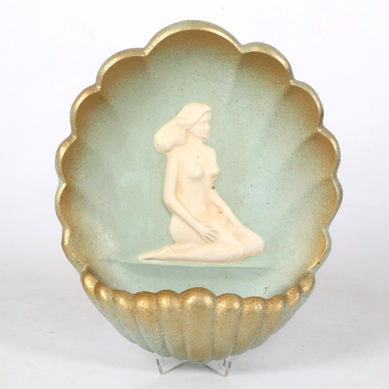 A seashell shaped wall lamp, 20th century.