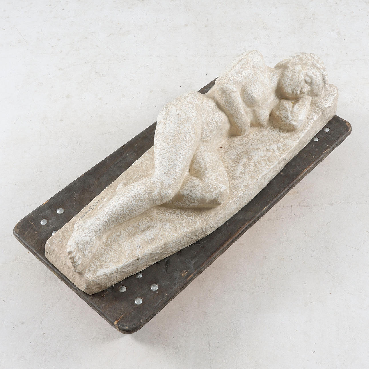 FELIX SÖDERBERG. Sculpture, reclining woman, patinated plaster, signed.