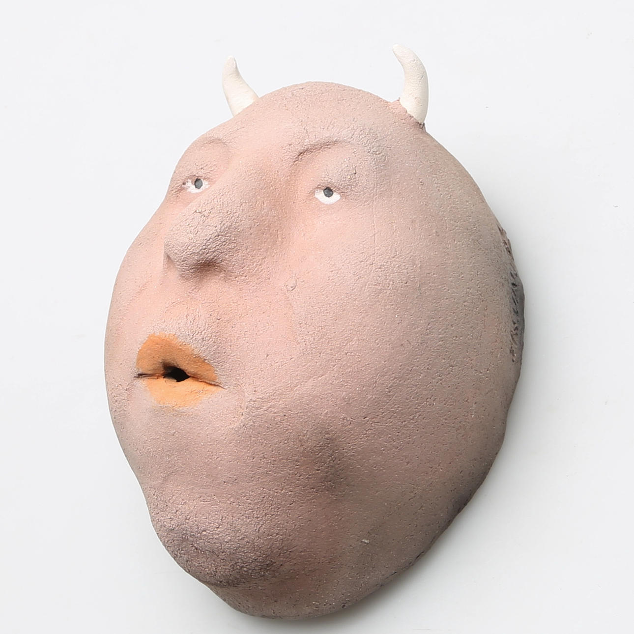 JOHAN THUNELL. Ansikte med horn, lergods, signerad Thunell.