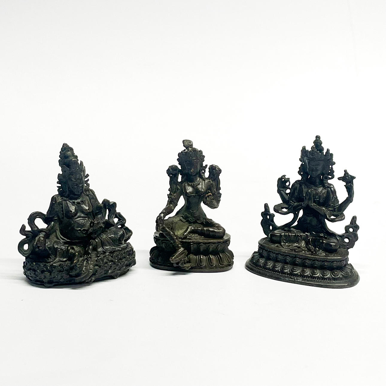 THREE BRONZE FIGURES BUDDHIST DEITIES.