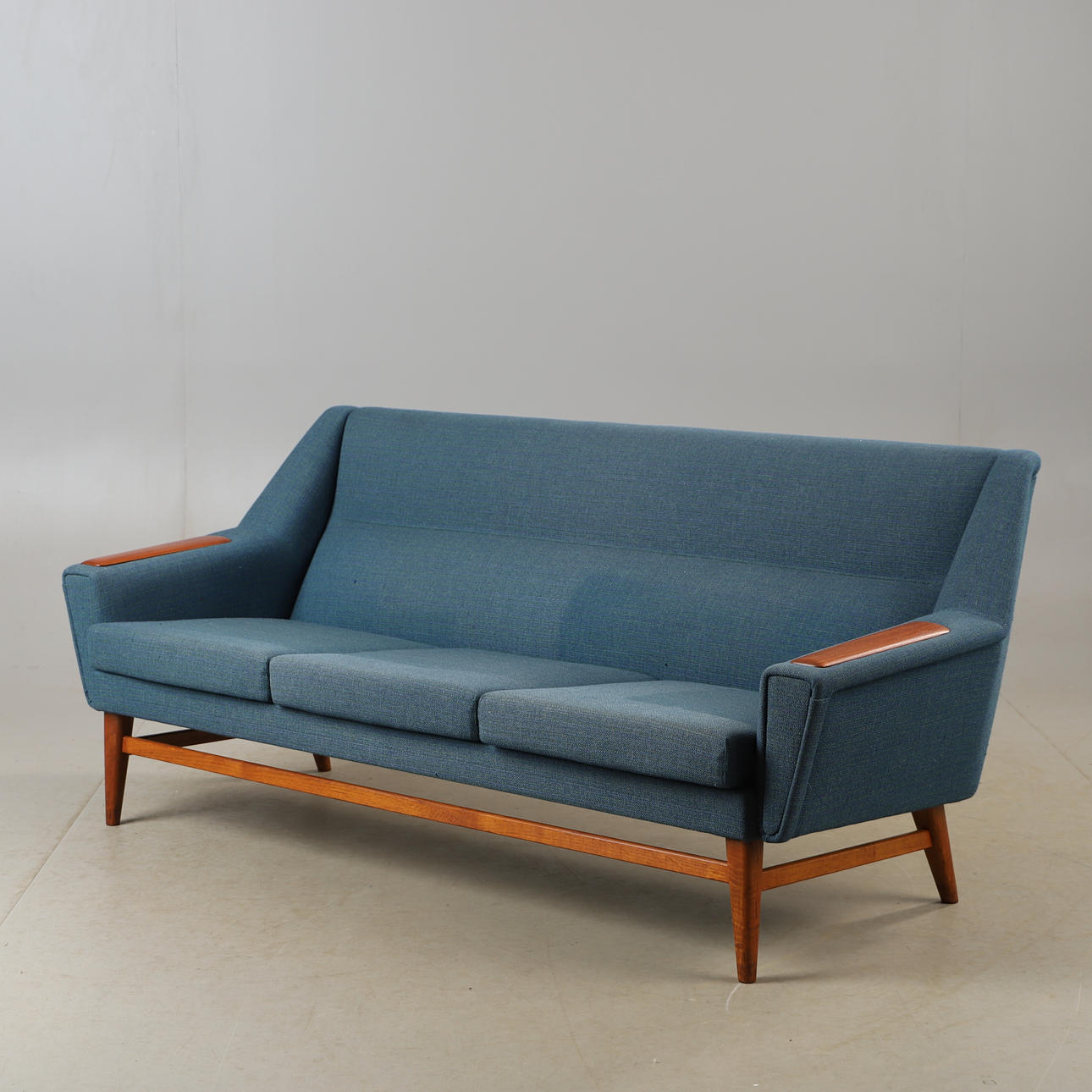 A teak sofa with textile upholstery, 1950s.