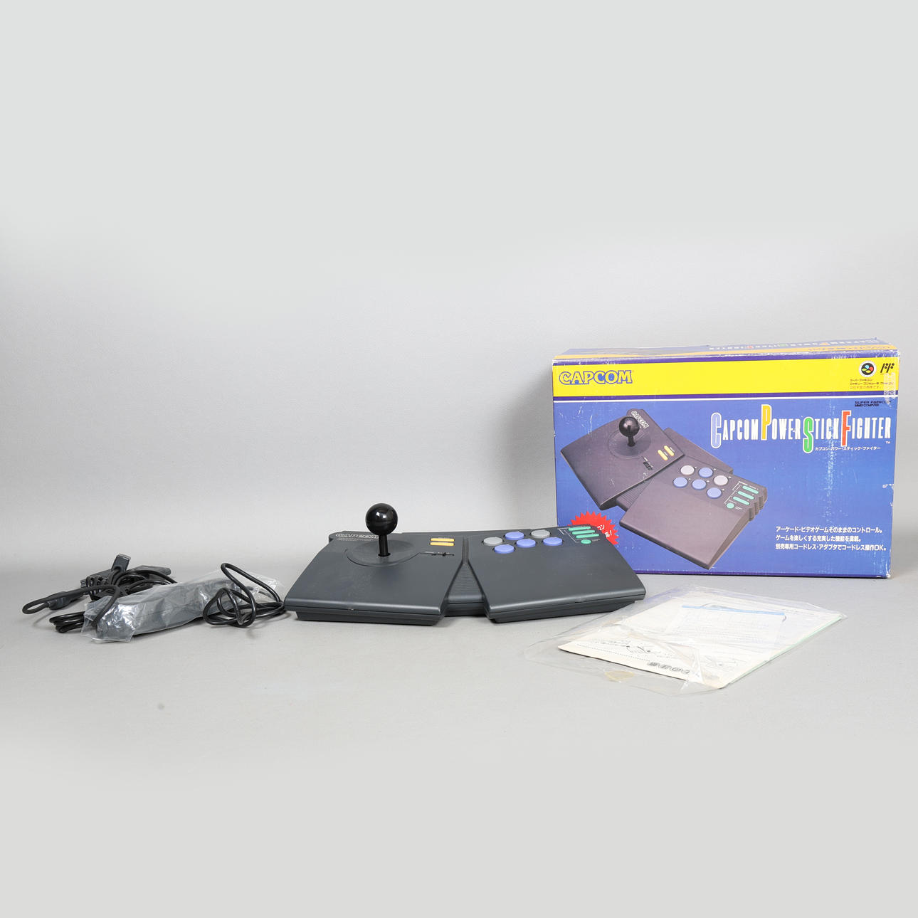 A BOXED CAPCOM POWER STICK FIGHTER, JAPANESE EDITION.