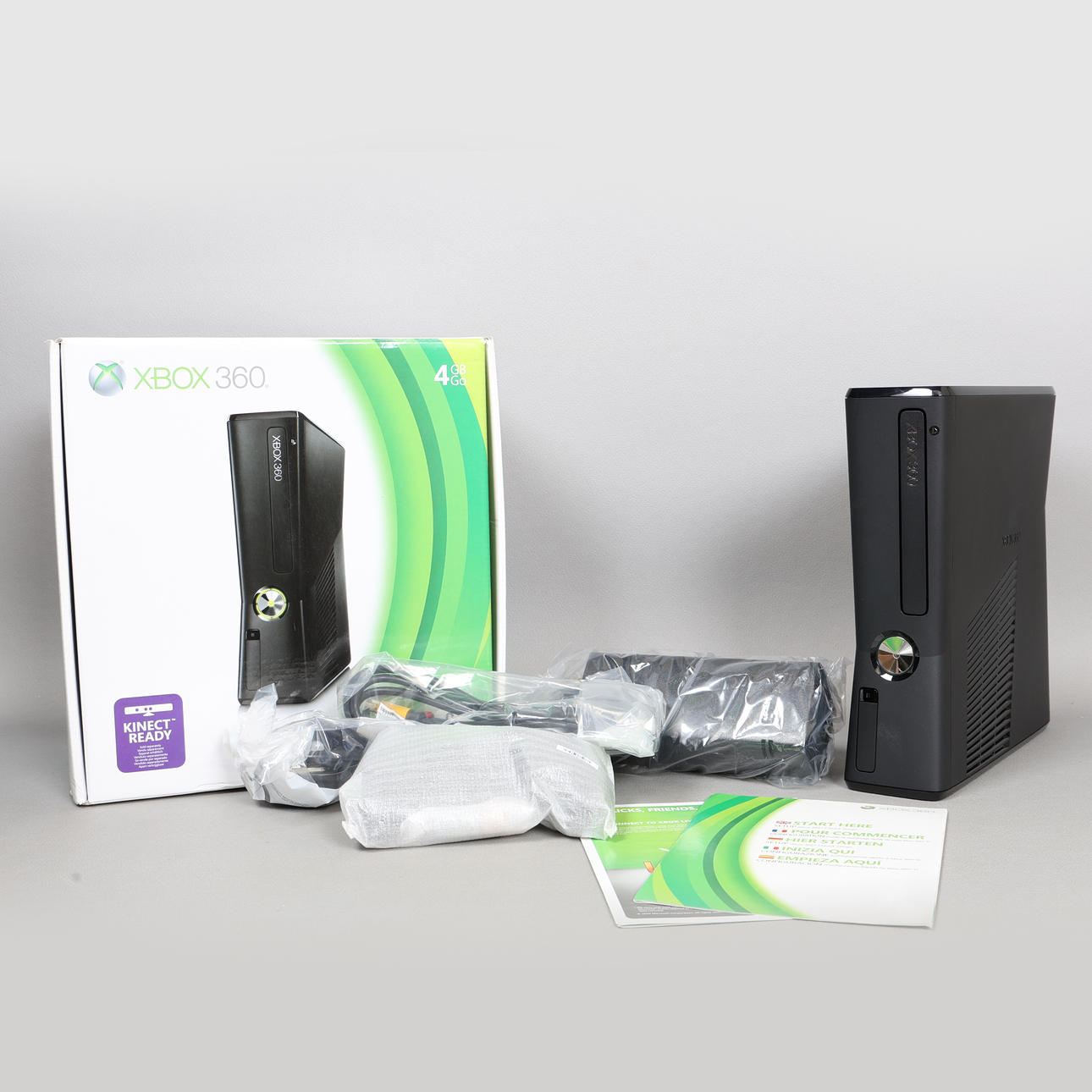 AN XBOX 360 GAMES CONSOLE, BLACK EDITION.