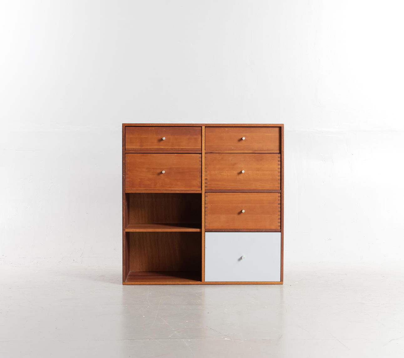 ATBO. Shelving module of solid tap-assembled mahogany, front with shelves and drawers. Manufactured and branded at ATBO, Denmark.