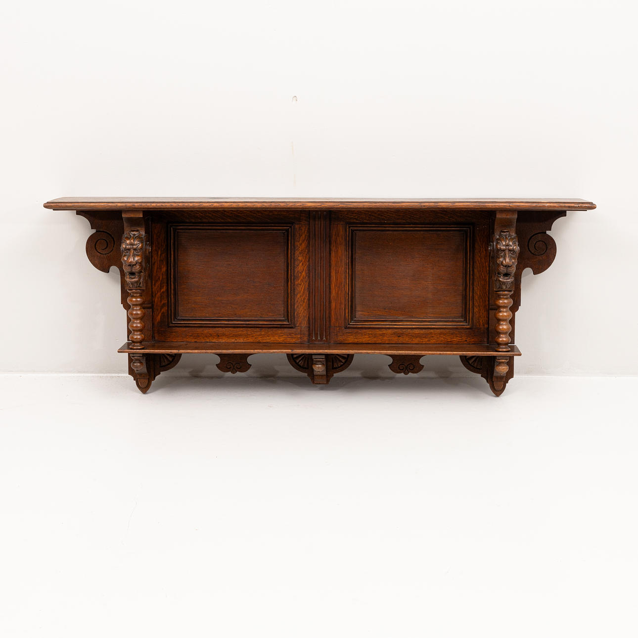 A Neo-Renaissance wall shelf, circa 1900.