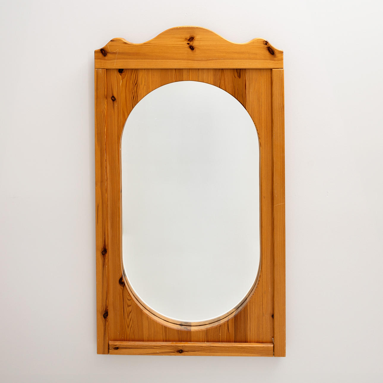 A mirror, frame made of solid pine, second half of the 20th century.