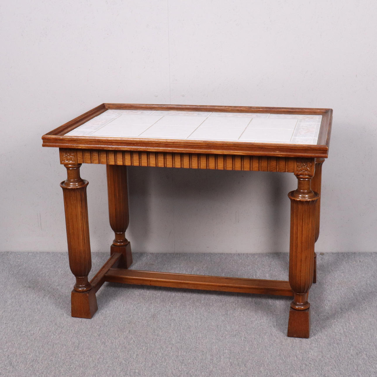 TABLE, wood with tiles.