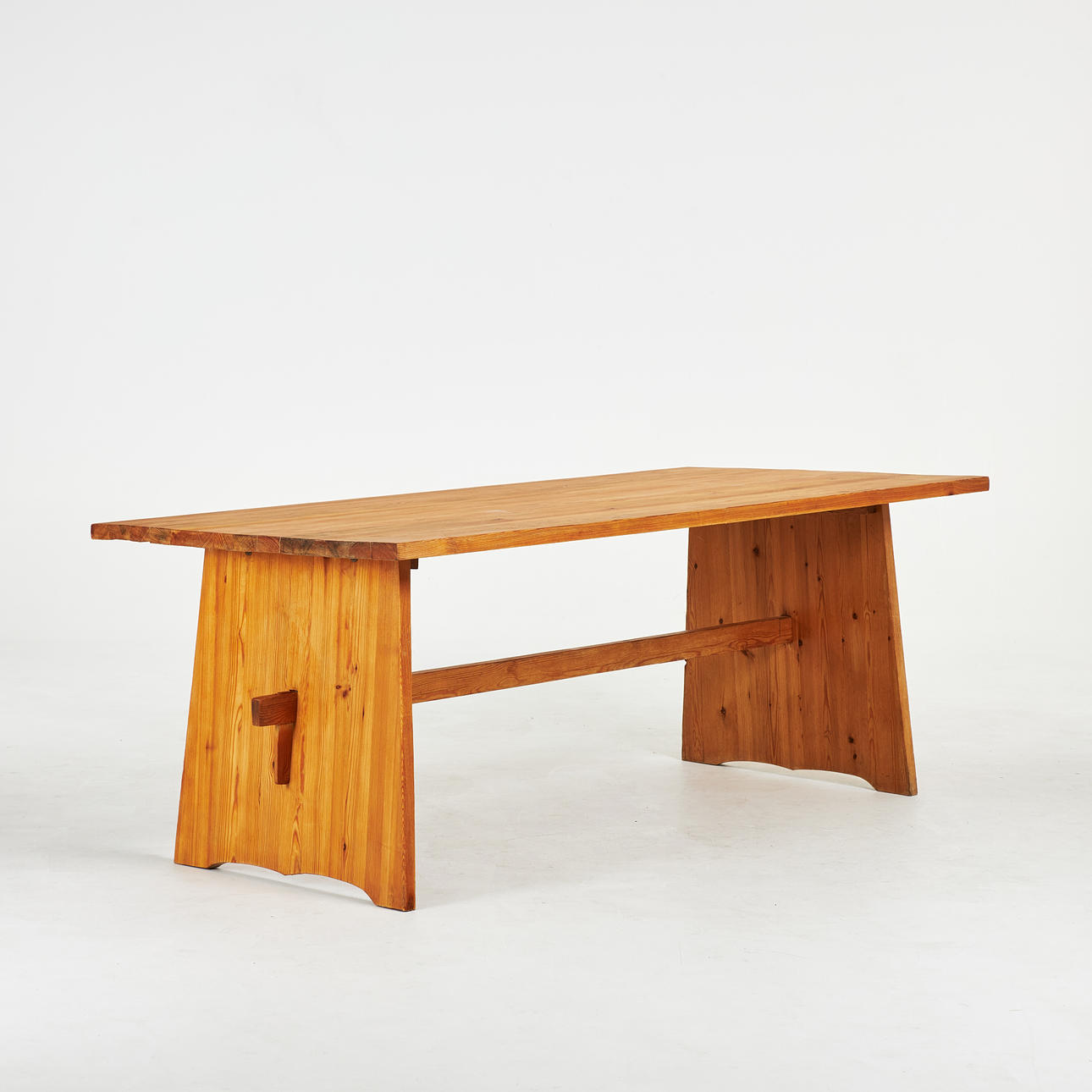 DINING TABLE. Mid-20th century, pine, leg stand with cross bar.