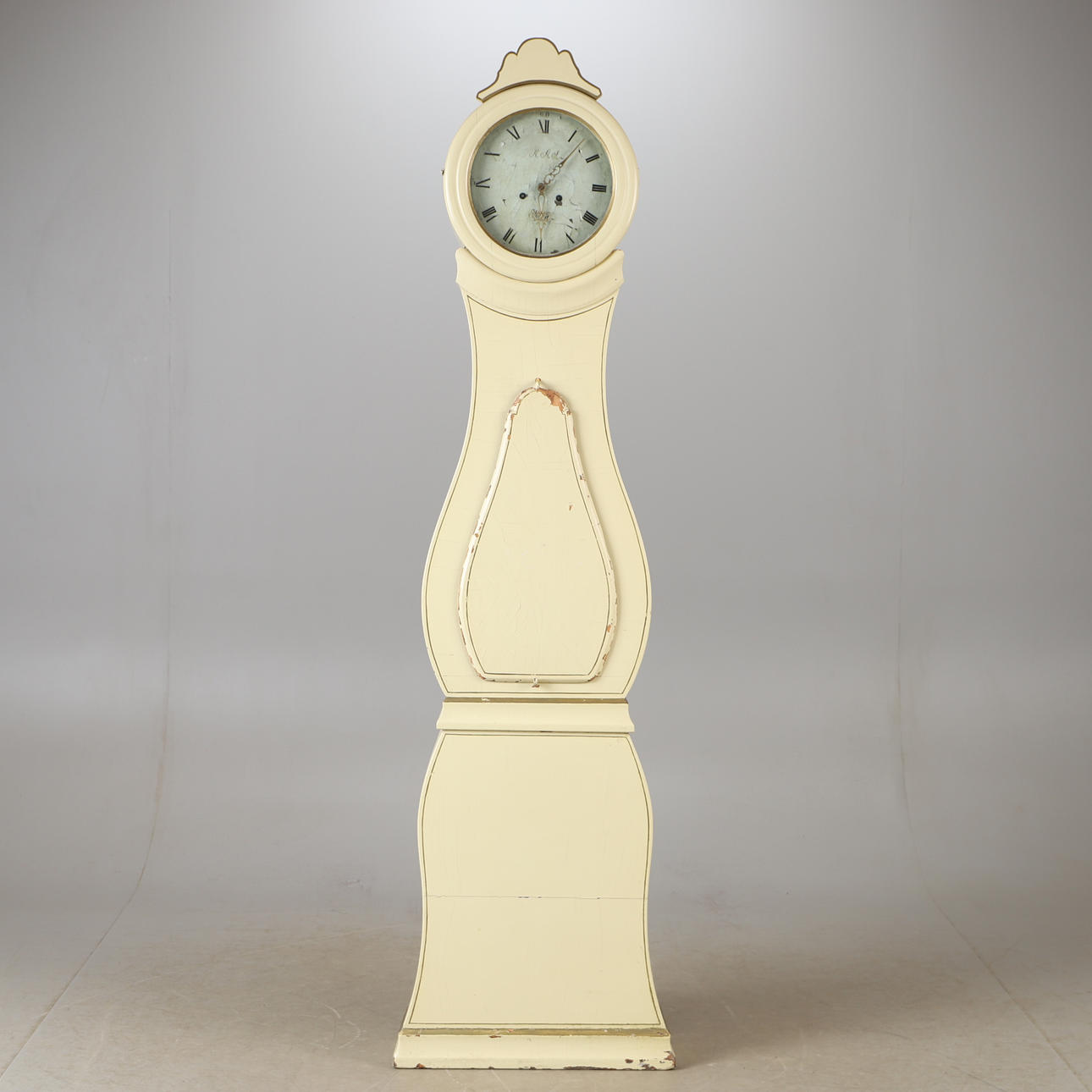 A 19th century white painted floor clock.