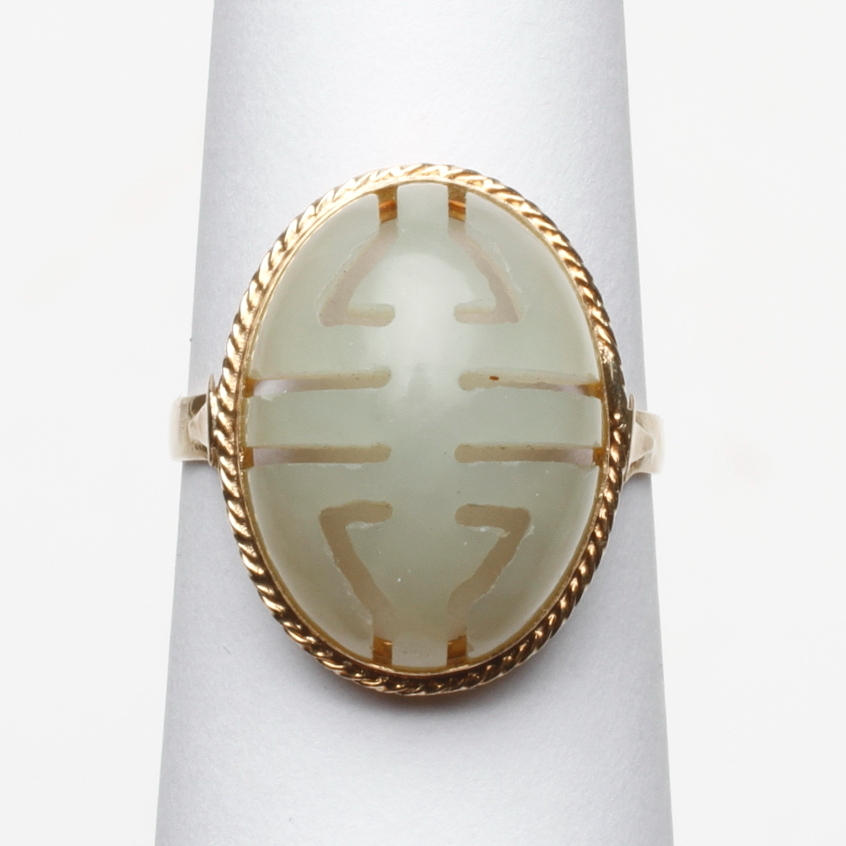 RING, 14k guld med sten, orientalisk, total vikt ca 4,2 gram.