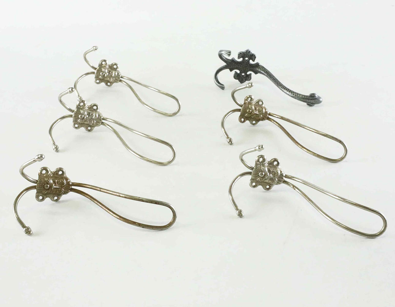 A set of 6 metal wall hooks, 19/2000's.