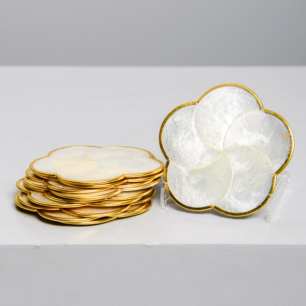 A glass coaster, capiz seashell, Shellman, 20th century.