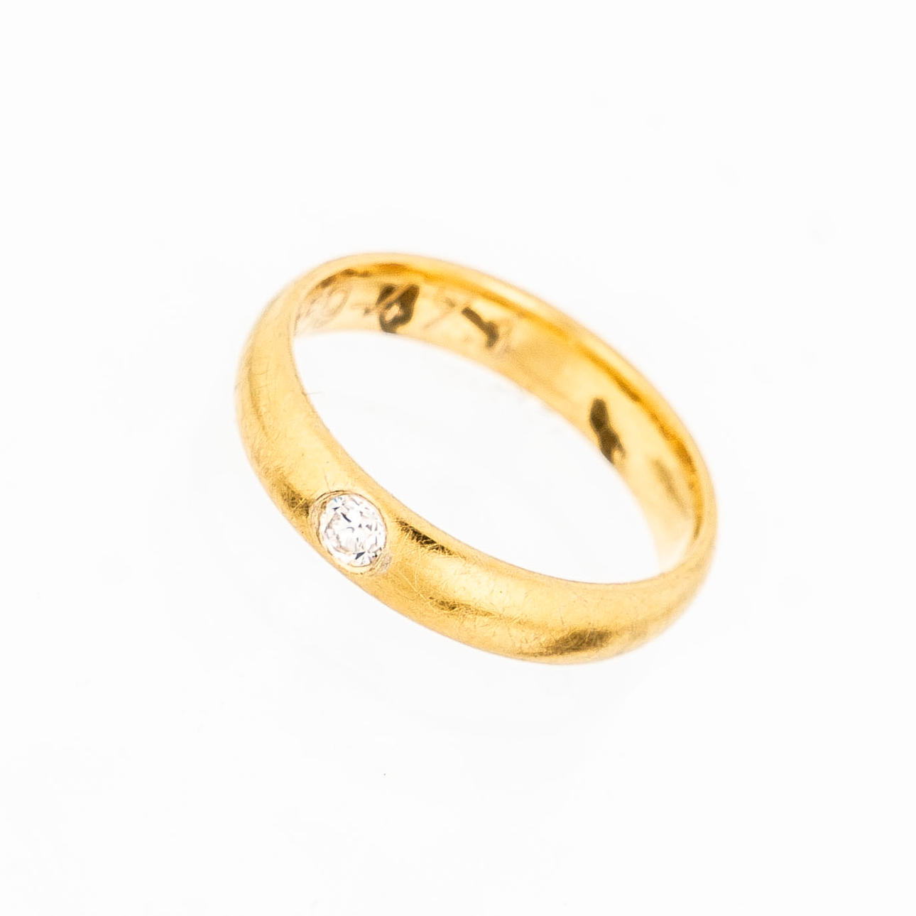 RING. 18K Gold with brilliant cut diamond 1900s.