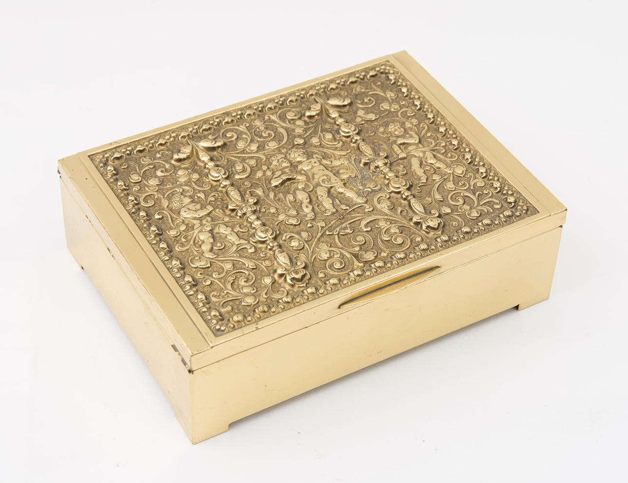 ERHARD & SÖHNE. Guldpläterad låda med mörkblå sammet interiör.