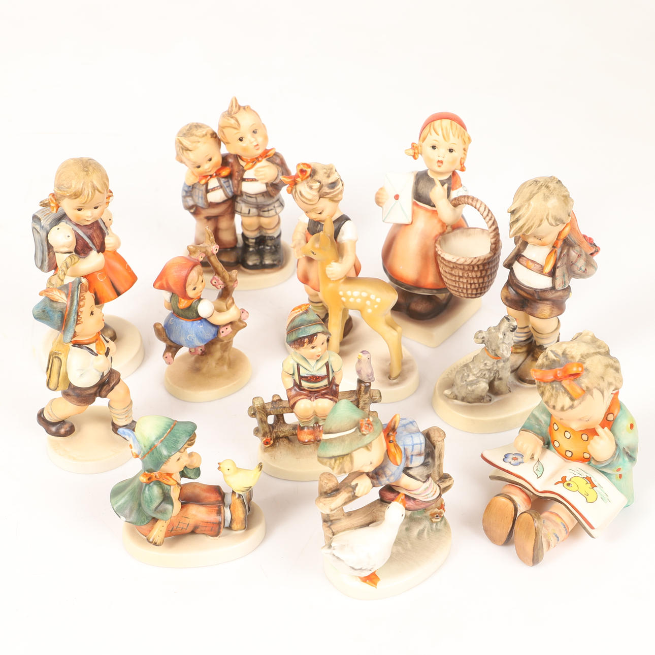 11 posliinihahmoja, Hummel/Goebel, Saksa.