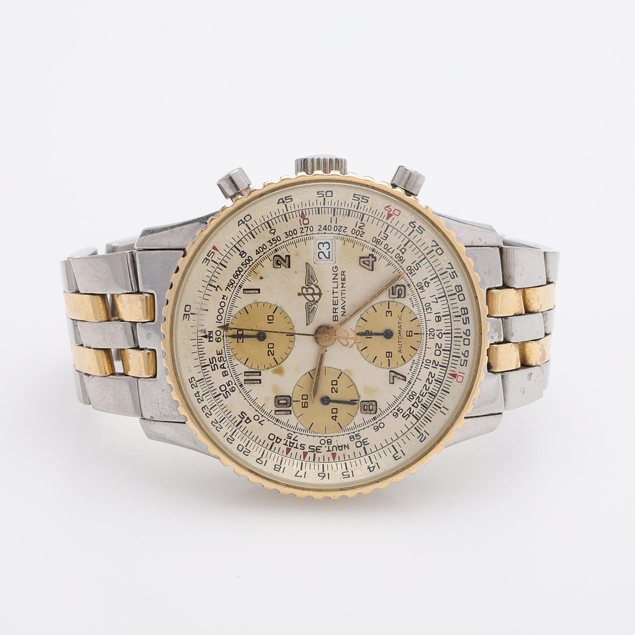 WRISTWATCH, BREITLING, OLD NAVITIMER, GOLD ON STEEL, AUTOMATIC ASSIGNMENT, 1990'S.