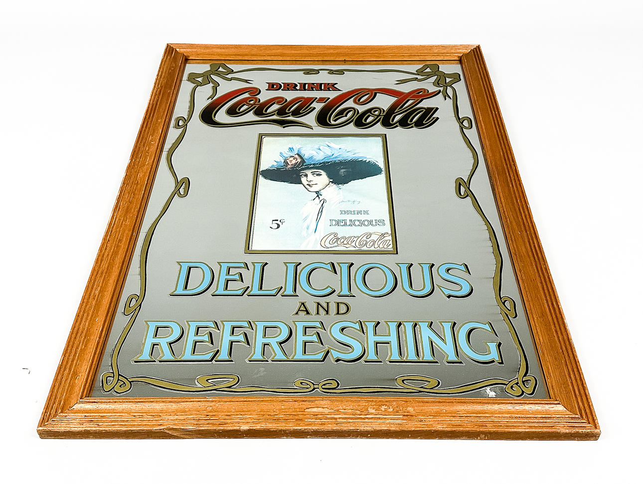 Mainospeili, ”Coca Cola”, 1900-luvun puoliväli.