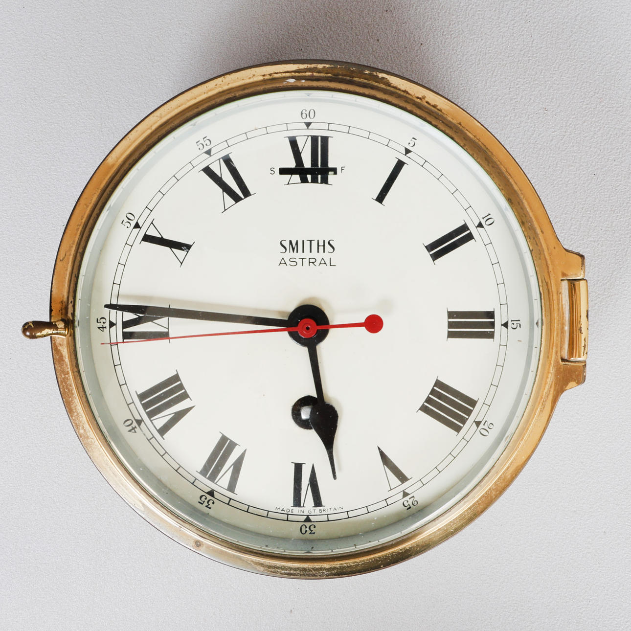 A SMITHS ASTRAL SHIPS BULKHEAD CLOCK.